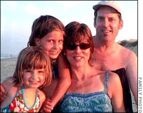 The Harvey family, on vacation at the beach