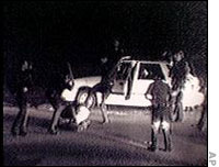 Officers beat Rodney King