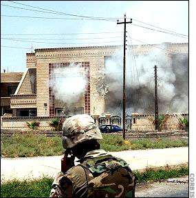 Soldiers shoot at villa harboring Saddam's sons