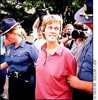 Diane Downs, escorted by police