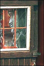 Bullet holes in the cabin door, Ruby Ridge (AP/Wide World)