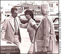 Sante escorted by police