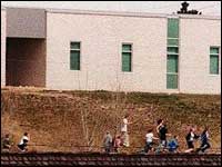 Students fleeing the high school (AP)