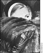 Mae Capone avoids reporters at Alcatraz