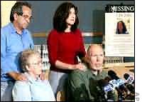 Press conference with Mark's parents (right) & Lori's parents
