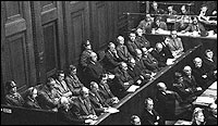 Nuremburg Trial defendants listening to testimony concerning the Wannsee conference (CORBIS)