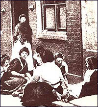 A common scene, outside a Spitalfields boarding house