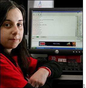 Young person at computer, involved in a blog