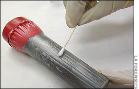 Testing the flashlight for prints