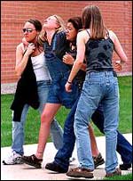 Students lean on each other for support