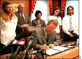 Gov. Jeb Bush signs the Jessica Lunsford Act into law